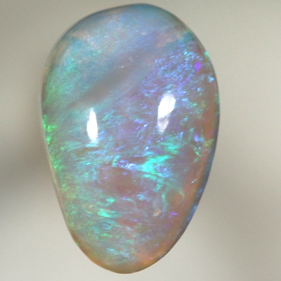 SOLID CRYSTAL OPAL Bright green fire in a 3 dimensional pattern
